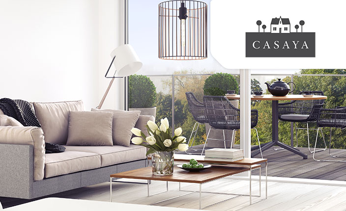 Eine Wohnung mit einer Terrasse die Möbeliert ist mit Casaya Eigenmarken Produkten